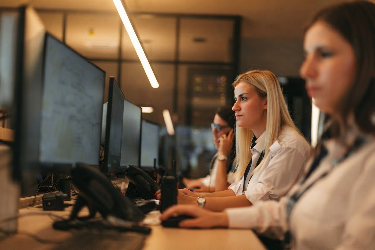 people monitoring computer screens