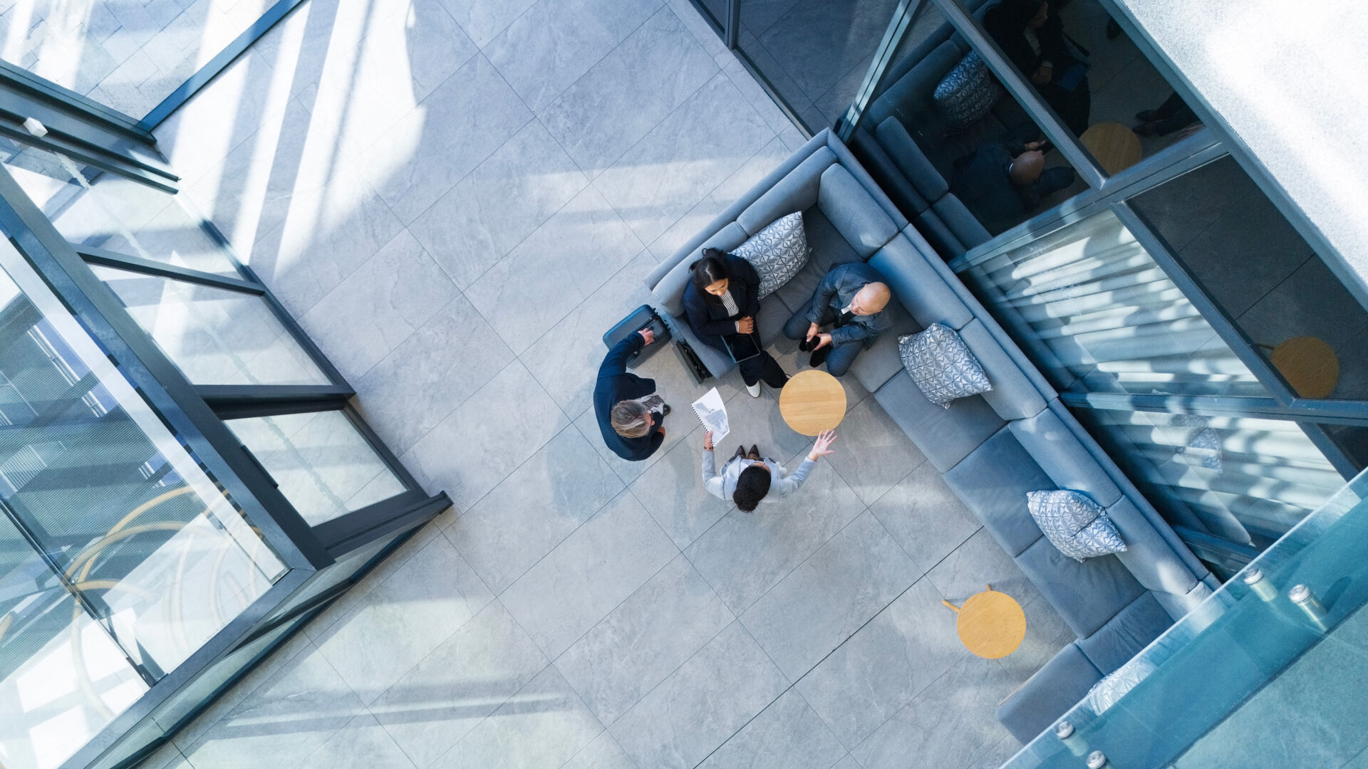 People in an office talking