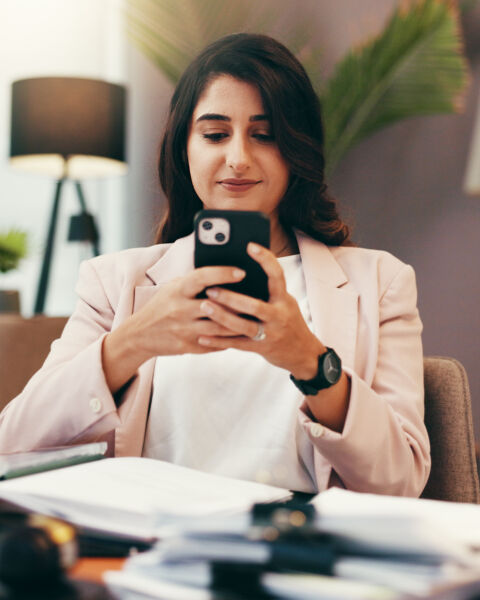 Phone, remote work and smile with woman in home office for account manager, financial advisor and communication. Virtual consultant, client portfolio and update with person for contact and email.