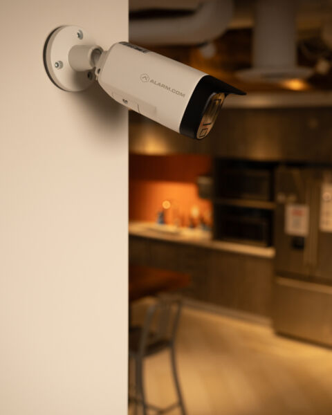 Commercial security camera mounted on an interior wall