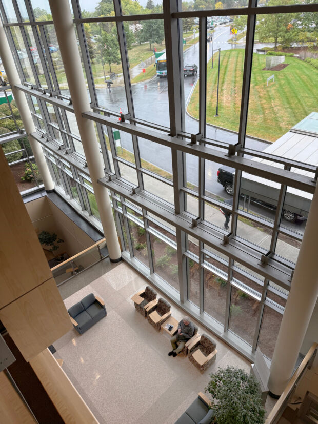 inside of a building with tall windows