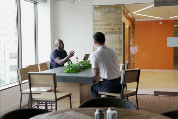 People talking at a table